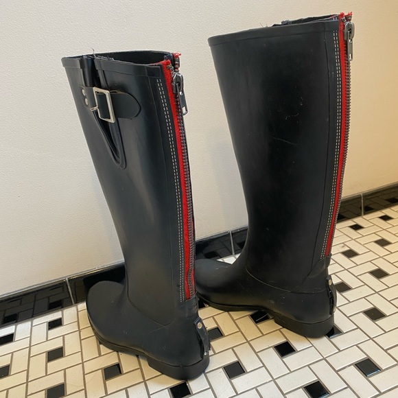 steve madden boots with red zipper up the back